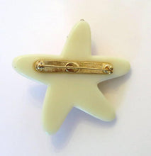 SOLD K.J.L. Faux ivory & coral cabochon starfish pin Kenneth J Lane
