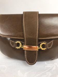 SOLD Vintage Gucci Leather flap clutch with Gold and Enamel horsebit closure 1970s