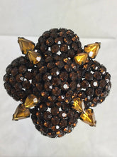 Warner large quatrefoil amber rhinestone encrusted pin