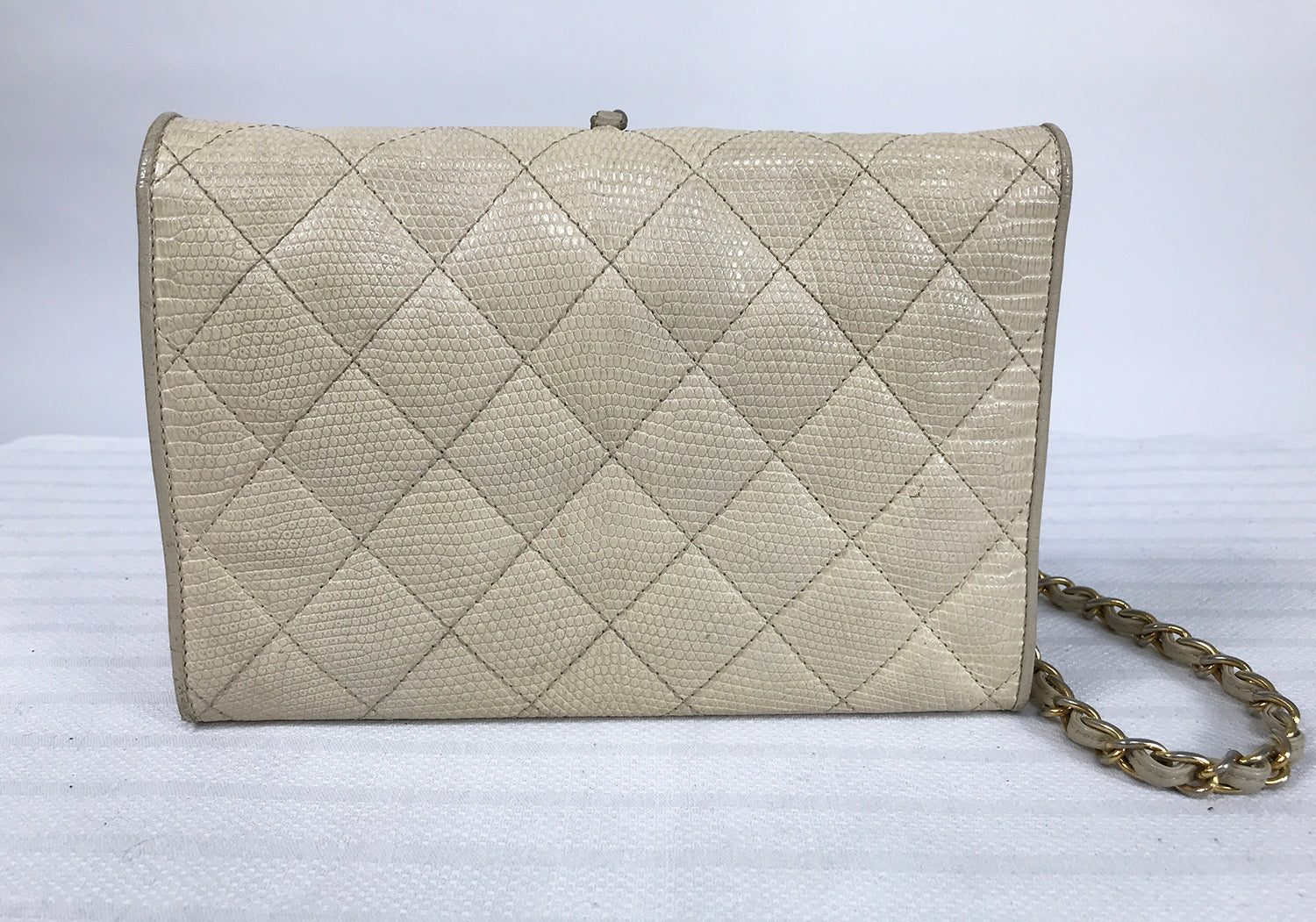 Chanel 1985-1989 Beige Lizard Quilted Tassel Camera Bag · INTO