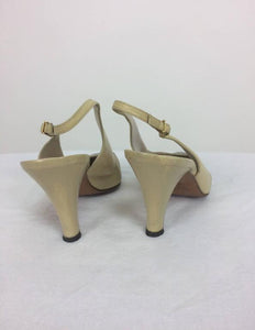 SOLD Chanel Cassic Bone and Back Sing Back Pumps 38